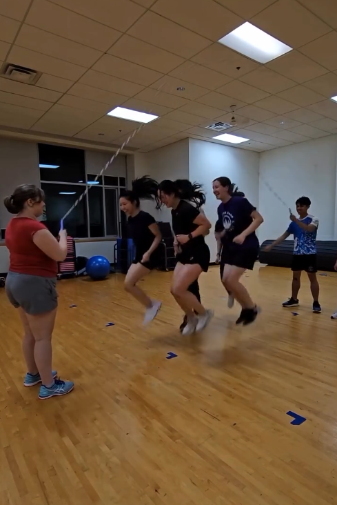 Group of club members jumping rope.